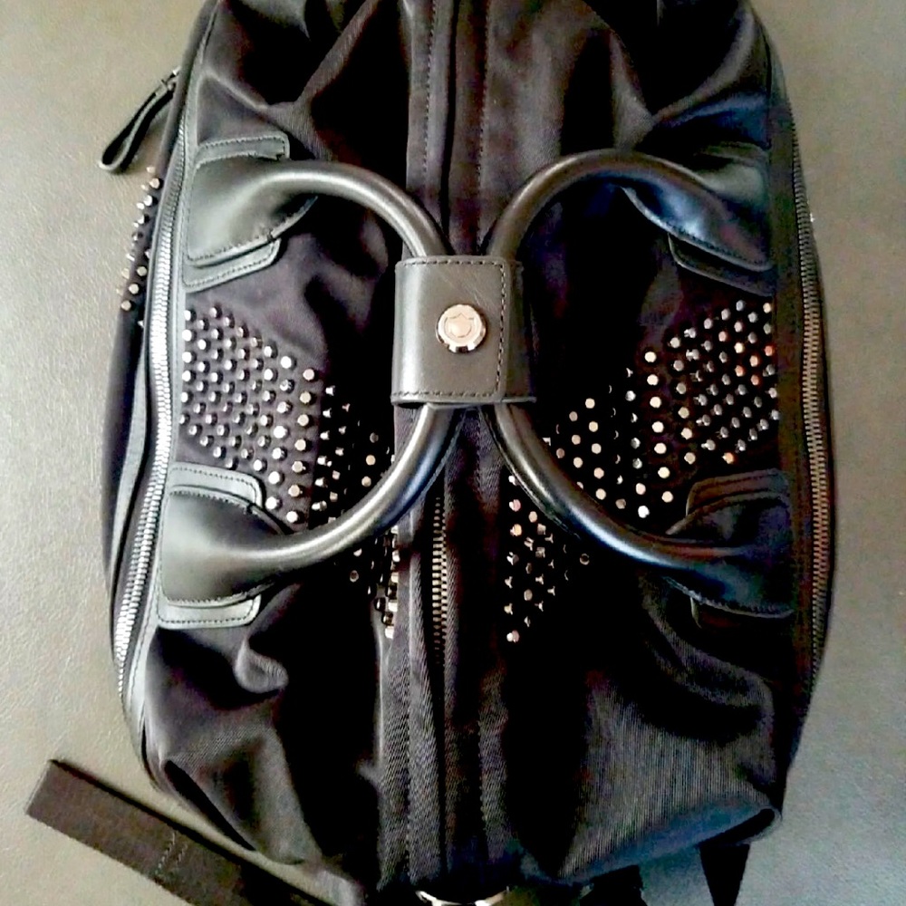 caraa convertible backpack medium with studs.  euc!